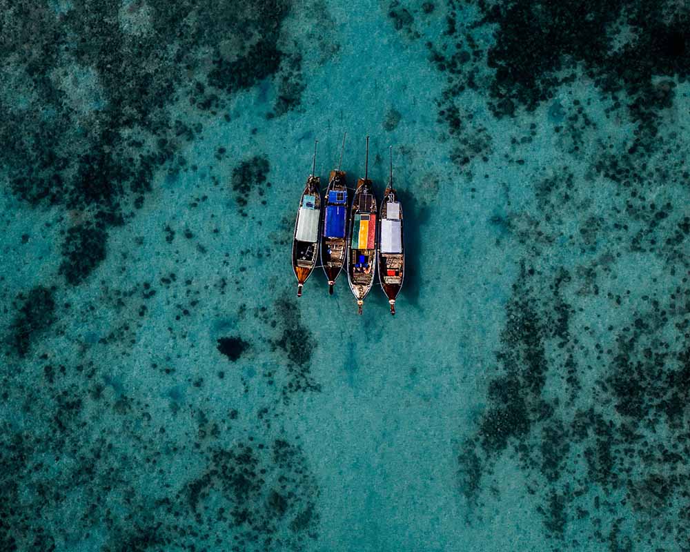 some boats together in a beautiful nature in Tailand!